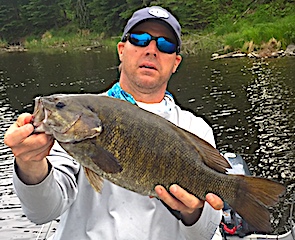 Mega Monster Trophy Smallmouth Bass Fishing at Fireside Lodge in Canada by Jason